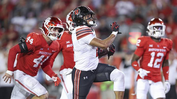 Oct 26, 2024; Houston, Texas, USA; Utah Utes running back Micah Bernard (2) runs with the ball and scores a touchdown during the third quarter against the Houston Cougars at TDECU Stadium. Mandatory Credit: Troy Taormina-Imagn Images Oct 26, 2024; Houston, Texas, USA; Utah Utes running back Micah Bernard (2) runs with the ball and scores a touchdown during the third quarter against the Houston Cougars at TDECU Stadium. Mandatory Credit: Troy Taormina-Imagn Images