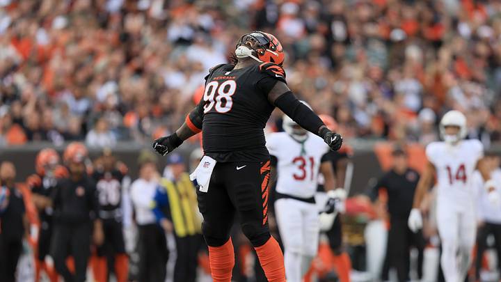 Dec 28, 2025; Cincinnati, Ohio, USA; Cincinnati Bengals defensive tackle T.J. Slaton Jr. (98) reacts after a play during the second half against the Arizona Cardinals at Paycor Stadium. Mandatory Credit: Katie Stratman-Imagn Images Dec 28, 2025; Cincinnati, Ohio, USA; Cincinnati Bengals defensive tackle T.J. Slaton Jr. (98) reacts after a play during the second half against the Arizona Cardinals at Paycor Stadium. Mandatory Credit: Katie Stratman-Imagn Images