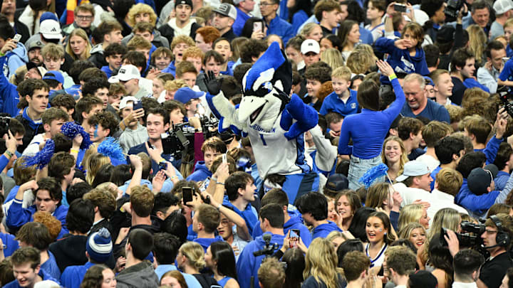 Dec 4, 2024; Omaha, Nebraska, USA; The mascot of the Creighton Bluejays celebrates on the court with fans after the win against the Kansas Jayhawks during the second half at CHI Health Center Omaha. Mandatory Credit: Steven Branscombe-Imagn Images