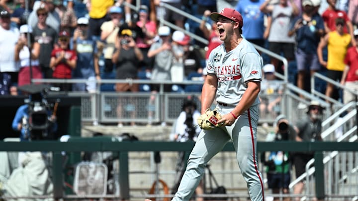 Jun 16, 2025; Omaha, Neb, USA;  Arkansas Razorbacks starting pitcher Gage Wood (14) celebrates completing a no hitter against the Murray State Racers at Charles Schwab Field. Mandatory Credit: Steven Branscombe-Imagn Images
