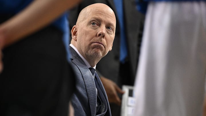 Feb 23, 2025; Los Angeles, California, USA; UCLA Bruins head coach Mick Cronin in the team huddle during a timeout in the first half against the Ohio State Buckeyes at Pauley Pavilion presented by Wescom. Mandatory Credit: Robert Hanashiro-Imagn Images Feb 23, 2025; Los Angeles, California, USA; UCLA Bruins head coach Mick Cronin in the team huddle during a timeout in the first half against the Ohio State Buckeyes at Pauley Pavilion presented by Wescom. Mandatory Credit: Robert Hanashiro-Imagn Images