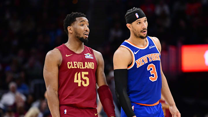 Apr 2, 2025; Cleveland, Ohio, USA; Cleveland Cavaliers guard Donovan Mitchell (45) talks to New York Knicks guard Josh Hart (3) during the second half at Rocket Arena. Mandatory Credit: Ken Blaze-Imagn Images