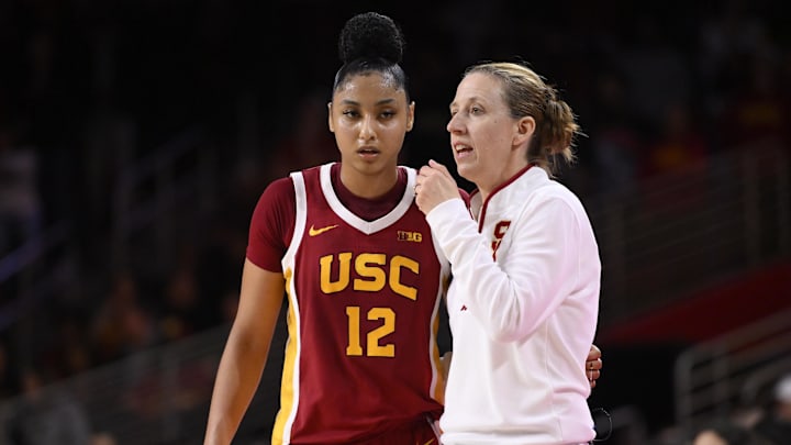 Feb 13, 2025; Los Angeles, California, USA; USC Trojans guard JuJu Watkins (12) and head coach Lindsay Gottlieb during the second half against the UCLA Bruins at Galen Center.