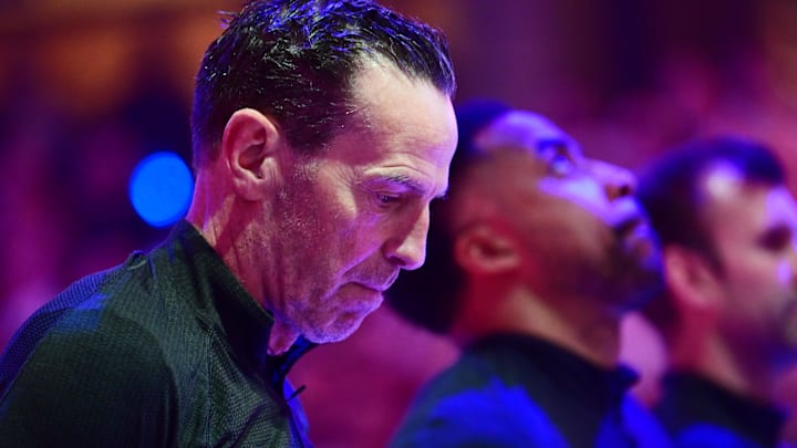 May 11, 2026; Cleveland, Ohio, USA; Cleveland Cavaliers head coach Kenny Atkinson listens to the national anthem before game four between the Cavaliers and the Detroit Pistons in the second round of the 2026 NBA Playoffs at Rocket Arena. Mandatory Credit: Ken Blaze-Imagn Images