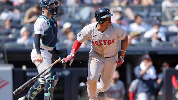 Boston Red Sox third baseman Rafael Devers (11) follows through on a two run single against the New York Yankees during the fifth inning at Yankee Stadium in 2024. Boston Red Sox third baseman Rafael Devers (11) follows through on a two run single against the New York Yankees during the fifth inning at Yankee Stadium in 2024.