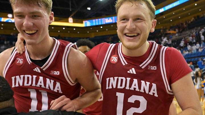 Jan 31, 2026; Los Angeles, California, USA; Indiana Hoosiers forward Trent Sisley (11) and forward Tucker DeVries (12) celebrate as they leave the court after defeating the UCLA Bruins in double overtime at Pauley Pavilion presented by Wescom Financial. Mandatory Credit: Jayne Kamin-Oncea-Imagn Images Jan 31, 2026; Los Angeles, California, USA; Indiana Hoosiers forward Trent Sisley (11) and forward Tucker DeVries (12) celebrate as they leave the court after defeating the UCLA Bruins in double overtime at Pauley Pavilion presented by Wescom Financial. Mandatory Credit: Jayne Kamin-Oncea-Imagn Images