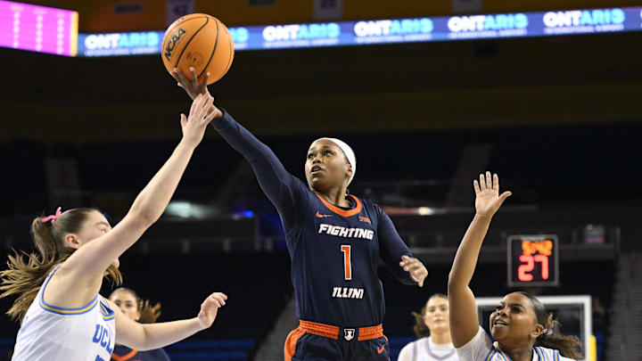 Feb 20, 2025; Los Angeles, California, USA; Illinois Fighting Illini guard Genesis Bryant (1) drives to the basket between UCLA Bruins guards Elina Aarnisalo (7) and Londynn Jones (3) during the first quarter at Pauley Pavilion presented by Wescom. Mandatory Credit: Robert Hanashiro-Imagn Images Feb 20, 2025; Los Angeles, California, USA; Illinois Fighting Illini guard Genesis Bryant (1) drives to the basket between UCLA Bruins guards Elina Aarnisalo (7) and Londynn Jones (3) during the first quarter at Pauley Pavilion presented by Wescom. Mandatory Credit: Robert Hanashiro-Imagn Images