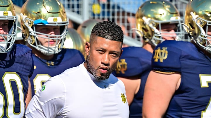Sep 21, 2024; South Bend, Indiana, USA; Notre Dame Fighting Irish head coach Marcus Freeman prepares to lead his players onto the field for the game against the Miami Redhawks at Notre Dame Stadium. Mandatory Credit: Matt Cashore-Imagn Images