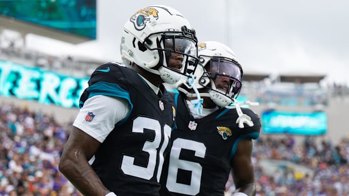 Nov 10, 2024; Jacksonville, Florida, USA; Jacksonville Jaguars cornerback Montaric Brown (30) and safety Darnell Savage (6) celebrates an interception against the Minnesota Vikings in the second quarter at EverBank Stadium. Mandatory Credit: Jeremy Reper-Imagn Images Nov 10, 2024; Jacksonville, Florida, USA; Jacksonville Jaguars cornerback Montaric Brown (30) and safety Darnell Savage (6) celebrates an interception against the Minnesota Vikings in the second quarter at EverBank Stadium. Mandatory Credit: Jeremy Reper-Imagn Images