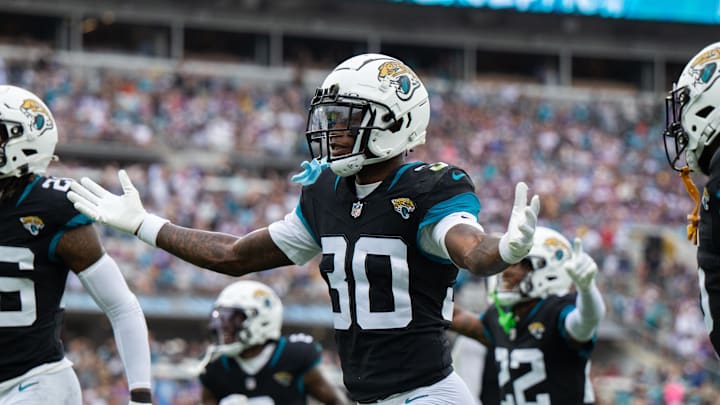 Nov 10, 2024; Jacksonville, Florida, USA; Jacksonville Jaguars cornerback Montaric Brown (30) celebrates his interception against the Minnesota Vikings in the second quarter at EverBank Stadium. Mandatory Credit: Jeremy Reper-Imagn Images