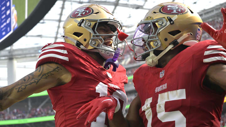 Sep 22, 2024; Inglewood, California, USA;  San Francisco 49ers wide receiver Jauan Jennings (15) celebrates with wide receiver Ronnie Bell (10) after scoring a touchdown in the second half against the Los Angeles Rams at SoFi Stadium. Mandatory Credit: Jayne Kamin-Oncea-Imagn Images