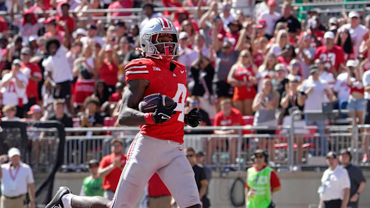 Sept. 21, 2024; Columbus, Ohio, USA;
Ohio State Buckeyes wide receiver Jeremiah Smith (4) cruises into the endzone for a touchdown during the second half of an NCAA Division I football game against the Marshall Thundering Herd at Ohio Stadium on Saturday.