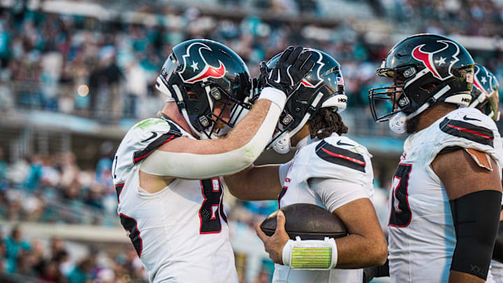 Dec 1, 2024; Jacksonville, Florida, USA; Houston Texans tight end Dalton Schultz (86) and quarterback C.J. Stroud (7) celebrate a touchdown in the fourth quarter at EverBank Stadium. Mandatory Credit: Jeremy Reper-Imagn Images Dec 1, 2024; Jacksonville, Florida, USA; Houston Texans tight end Dalton Schultz (86) and quarterback C.J. Stroud (7) celebrate a touchdown in the fourth quarter at EverBank Stadium. Mandatory Credit: Jeremy Reper-Imagn Images