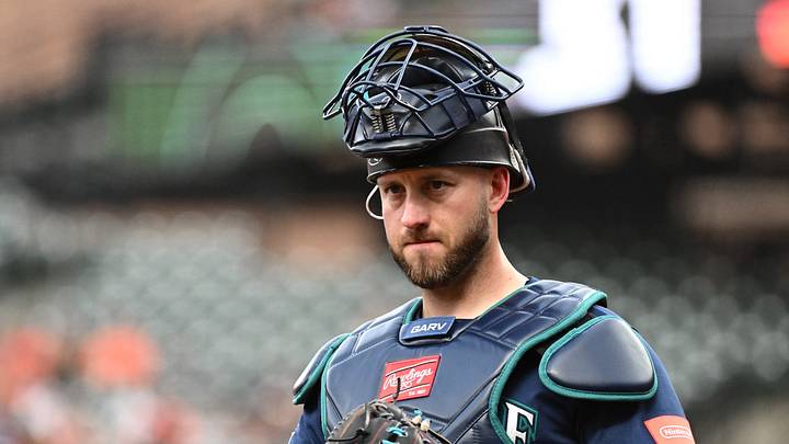 Jun 9, 2026; Baltimore, Maryland, USA; Seattle Mariners catcher Mitch Garver (18) looks toward the dugout during the second inning against the Baltimore Orioles at Oriole Park at Camden Yards. Mandatory Credit: James A. Pittman-Imagn Images Jun 9, 2026; Baltimore, Maryland, USA; Seattle Mariners catcher Mitch Garver (18) looks toward the dugout during the second inning against the Baltimore Orioles at Oriole Park at Camden Yards. Mandatory Credit: James A. Pittman-Imagn Images