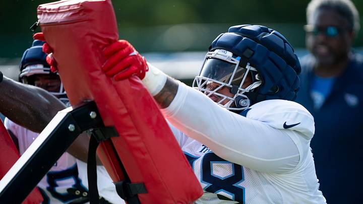 The Tennessee Titans Jeffrey Simmons (98) hits the pads during the Tennessee Titans training camp at Ascension Saint Thomas Sports Park in Nashville, Tenn., Tuesday, July 30, 2024. The Tennessee Titans Jeffrey Simmons (98) hits the pads during the Tennessee Titans training camp at Ascension Saint Thomas Sports Park in Nashville, Tenn., Tuesday, July 30, 2024.