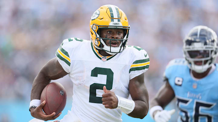 Green Bay Packers quarterback Malik Willis runs the ball against the Tennessee Titans