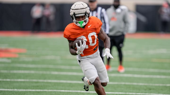 Oklahoma State running back Rodney Fields Jr. (20) runs the ball during an Oklahoma State spring football showcase at Boone Pickens Stadium in Stillwater, Okla., Saturday, April 19, 2025.