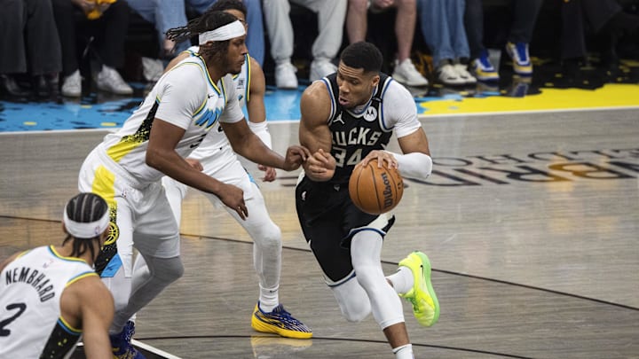 Apr 19, 2025; Indianapolis, Indiana, USA; Milwaukee Bucks forward Giannis Antetokounmpo (34) dribbles the ball while Indiana Pacers center Myles Turner (33) defends in the first half at Gainbridge Fieldhouse. Mandatory Credit: Trevor Ruszkowski-Imagn Images Apr 19, 2025; Indianapolis, Indiana, USA; Milwaukee Bucks forward Giannis Antetokounmpo (34) dribbles the ball while Indiana Pacers center Myles Turner (33) defends in the first half at Gainbridge Fieldhouse. Mandatory Credit: Trevor Ruszkowski-Imagn Images