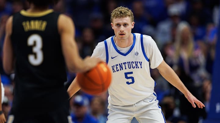 Feb 19, 2025; Lexington, Kentucky, USA; Kentucky Wildcats guard Collin Chandler (5) guards Vanderbilt Commodores guard Tyler Tanner (3) during the second half at Rupp Arena at Central Bank Center. Mandatory Credit: Jordan Prather-Imagn Images