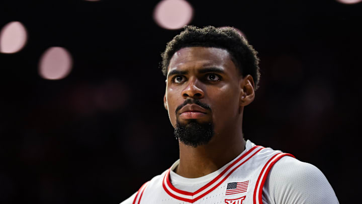 Feb 26, 2025; Tucson, Arizona, USA; Arizona Wildcats guard KJ Lewis (5) watches the game intensely from the bench during the second half against the Utah Utes at McKale Center. Mandatory Credit: Aryanna Frank-Imagn Images
