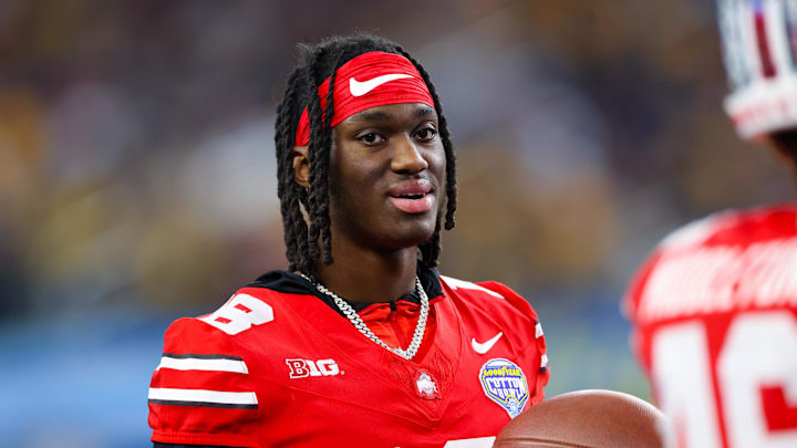 Dec 29, 2023; Arlington, TX, USA;  Ohio State Buckeyes wide receiver Marvin Harrison Jr. (18) looks