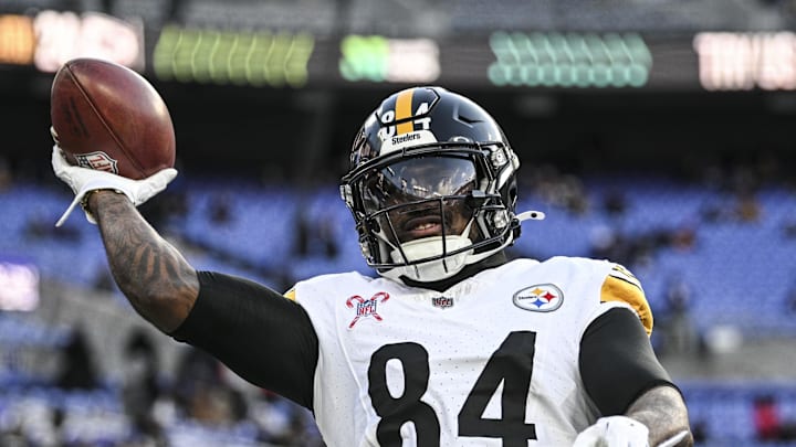 Dec 21, 2024; Baltimore, Maryland, USA;  Pittsburgh Steelers running back Cordarrelle Patterson (84) throws the ball to fans before the game against the Baltimore Ravens at M&T Bank Stadium. Mandatory Credit: Tommy Gilligan-Imagn Images