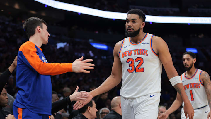 Mar 2, 2025; Miami, Florida, USA; New York Knicks center Karl-Anthony Towns (32) high-fives with teammates during the second quarter against the Miami Heat at Kaseya Center. Mandatory Credit: Sam Navarro-Imagn Images Mar 2, 2025; Miami, Florida, USA; New York Knicks center Karl-Anthony Towns (32) high-fives with teammates during the second quarter against the Miami Heat at Kaseya Center. Mandatory Credit: Sam Navarro-Imagn Images