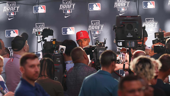 Jul 14, 2024; Ft. Worth, TX, USA;  Christian Moore speaks to the media after being selected by the Los Angeles Angels as the eight player taken during the first round of the MLB Draft at Cowtown Coliseum. Mandatory Credit: Kevin Jairaj-Imagn Images