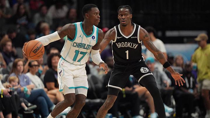Oct 6, 2026; Charlotte, North Carolina, USA;  Brooklyn Nets guard Keon Ellis (1) on defense against Charlotte Hornets guard Dennis Schroder (17) during the second quarter at Spectrum Center.  Mandatory Credit: Jim Dedmon-Imagn Images