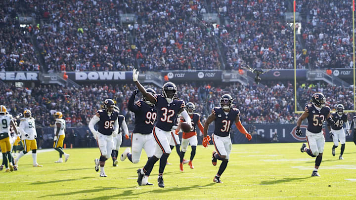 Terell Smith celebrates with Bears teammates after his interception at the goal line stopped a Packers drive.