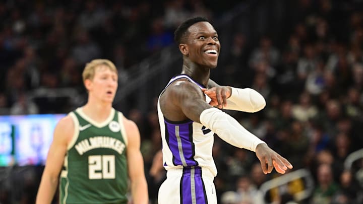 Nov 1, 2025; Milwaukee, Wisconsin, USA;  Sacramento Kings guard Dennis Schroder (17) reacts after scoring a basket in the 3rd quarter as Milwaukee Bucks guard AJ Green (20) looks on at Fiserv Forum. Mandatory Credit: Benny Sieu-Imagn Images