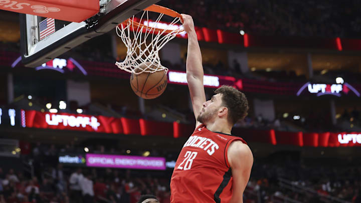 Mar 8, 2025; Houston, Texas, USA;  Houston Rockets center Alperen Sengun (28) dunks the ball during the third quarter against the New Orleans Pelicans at Toyota Center. Mandatory Credit: Troy Taormina-Imagn Images