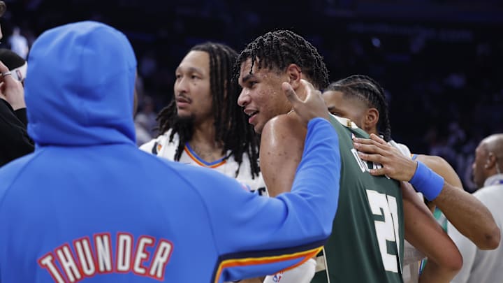 Feb 12, 2026; Oklahoma City, Oklahoma, USA; Milwaukee Bucks forward Ousmane Dieng (21) meets with his former Oklahoma City Thunder players after their game at Paycom Center. Mandatory Credit: Alonzo Adams-Imagn Images Feb 12, 2026; Oklahoma City, Oklahoma, USA; Milwaukee Bucks forward Ousmane Dieng (21) meets with his former Oklahoma City Thunder players after their game at Paycom Center. Mandatory Credit: Alonzo Adams-Imagn Images