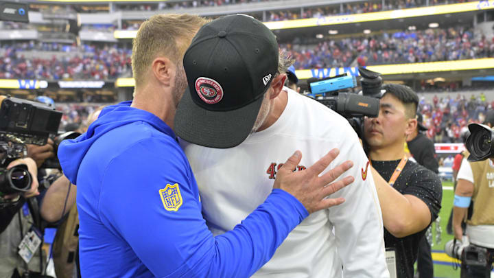 Sep 22, 2024; Inglewood, California, USA;  Los Angeles Rams head coach Sean McVay and San Francisco 49ers head coach Kyle Shanahan meet on the field following the game at SoFi Stadium. Mandatory Credit: Jayne Kamin-Oncea-Imagn Images