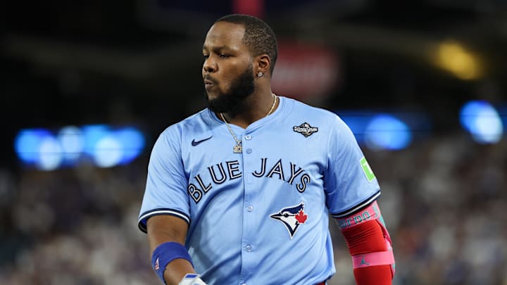 Oct 29, 2025; Los Angeles, California, USA; Toronto Blue Jays first baseman Vladimir Guerrero Jr. (27) reacts after grounding into a double play during the fifth inning against the Los Angeles Dodgers during game five of the 2025 MLB World Series at Dodger Stadium. Oct 29, 2025; Los Angeles, California, USA; Toronto Blue Jays first baseman Vladimir Guerrero Jr. (27) reacts after grounding into a double play during the fifth inning against the Los Angeles Dodgers during game five of the 2025 MLB World Series at Dodger Stadium.