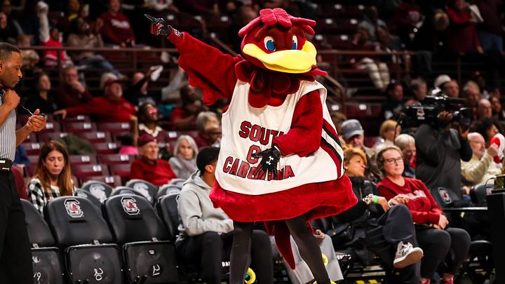 Dec 7, 2025; Columbia, South Carolina, USA; South Carolina Gamecocks mascot Cocky cheers on his team against the North Carolina Central Eagles in the first half at Colonial Life Arena. Mandatory Credit: Jeff Blake-Imagn Images Dec 7, 2025; Columbia, South Carolina, USA; South Carolina Gamecocks mascot Cocky cheers on his team against the North Carolina Central Eagles in the first half at Colonial Life Arena. Mandatory Credit: Jeff Blake-Imagn Images
