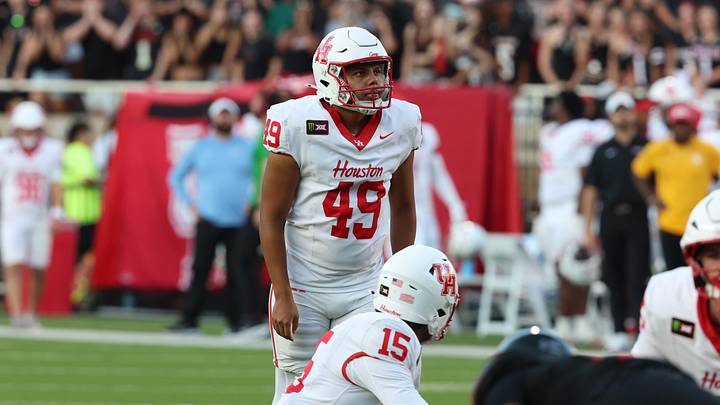 Sep 18, 2026; Lubbock, Texas, USA;  Houston Cougars place kicker Jonathan Dimas (49) prepares to kick a field goal against the Texas Tech Red Raiders in the first half at Galaxy Stadium. Mandatory Credit: Michael C. Johnson-Imagn Images