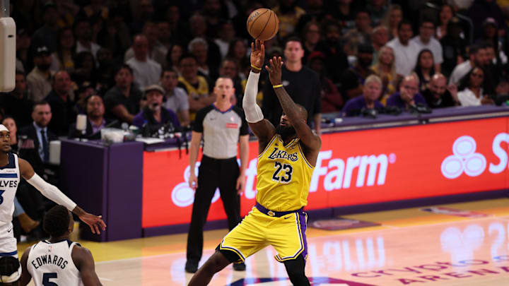 Apr 22, 2025; Los Angeles, California, USA; Los Angeles Lakers forward LeBron James (23) shoots the ball over Minnesota Timberwolves guard Anthony Edwards (5) during the fourth quarter of game two of first round for the 2024 NBA Playoffs at Crypto.com Arena. Mandatory Credit: Kiyoshi Mio-Imagn Images Apr 22, 2025; Los Angeles, California, USA; Los Angeles Lakers forward LeBron James (23) shoots the ball over Minnesota Timberwolves guard Anthony Edwards (5) during the fourth quarter of game two of first round for the 2024 NBA Playoffs at Crypto.com Arena. Mandatory Credit: Kiyoshi Mio-Imagn Images