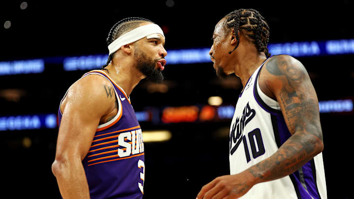 Oct 22, 2025; Phoenix, Arizona, USA; Phoenix Suns forward Dillon Brooks (3) and Sacramento Kings guard DeMar DeRozan (10) exchange words during the second half at the Mortgage Matchup Center. Mandatory Credit: Mark J. Rebilas-Imagn Images