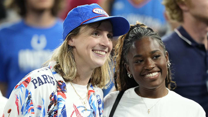 Aug 8, 2024; Paris, France; American swimmer Katie Ledecky poses for a photograph in a men's basketball semifinal game between the United States and Serbia during the Paris 2024 Olympic Summer Games at Accor Arena. Mandatory Credit: Kyle Terada-Imagn Images Aug 8, 2024; Paris, France; American swimmer Katie Ledecky poses for a photograph in a men's basketball semifinal game between the United States and Serbia during the Paris 2024 Olympic Summer Games at Accor Arena. Mandatory Credit: Kyle Terada-Imagn Images