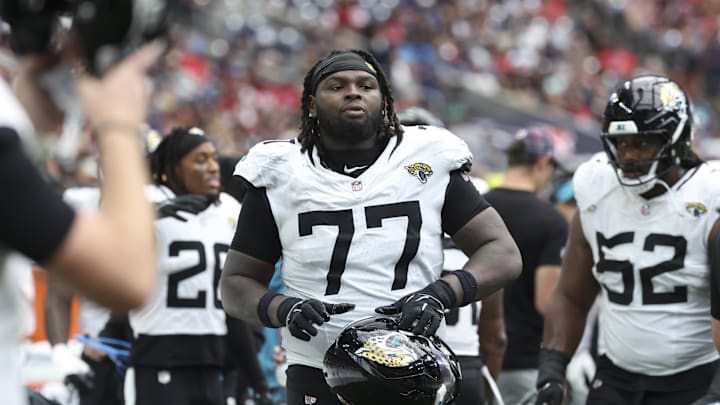 Sep 29, 2024; Houston, Texas, USA; Jacksonville Jaguars offensive tackle Anton Harrison (77) during the game against the Houston Texans at NRG Stadium. Mandatory Credit: Troy Taormina-Imagn Images
