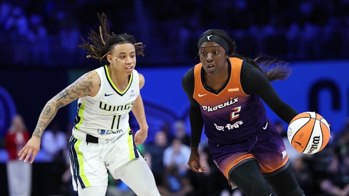 Jul 3, 2025; Arlington, Texas, USA;  Phoenix Mercury guard Kahleah Copper (2) drives to the basket as Dallas Wings guard JJ Quinerly (11) defends during the second half at College Park Center. Mandatory Credit: Kevin Jairaj-Imagn Images