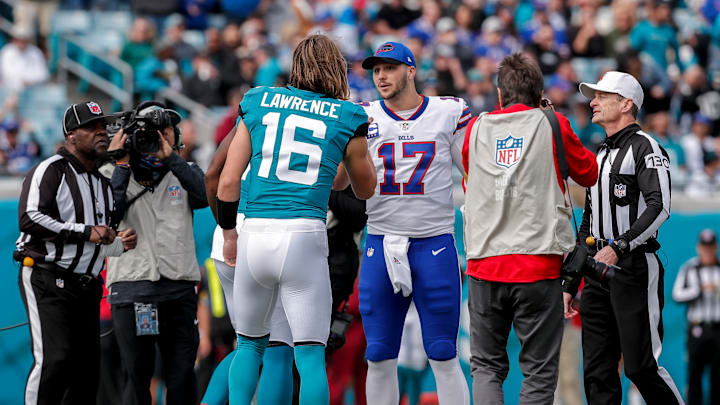 Buffalo Bills QB Josh Allen and Jacksonville Jaguars QB Trevor Lawrence shake hands