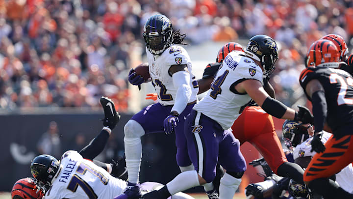 Oct 6, 2024; Cincinnati, Ohio, USA; Baltimore Ravens running back Derrick Henry (22) runs the ball during the first quarter against the Cincinnati Bengals at Paycor Stadium. Mandatory Credit: Joseph Maiorana-Imagn Images