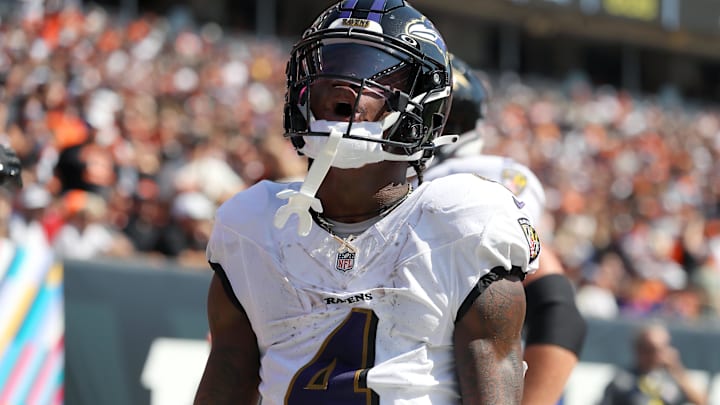 Oct 6, 2024; Cincinnati, Ohio, USA; Baltimore Ravens wide receiver Zay Flowers (4) celebrates the team’s touchdown during the second quarter against the Cincinnati Bengals at Paycor Stadium. Mandatory Credit: Joseph Maiorana-Imagn Images