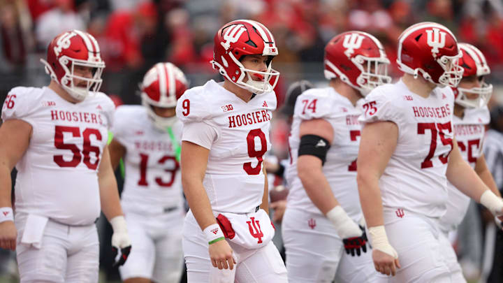 Indiana Hoosiers quarterback Kurtis Rourke (9) looks for the play during the first half against the Ohio State Buckeyes at Ohio Stadium. Indiana Hoosiers quarterback Kurtis Rourke (9) looks for the play during the first half against the Ohio State Buckeyes at Ohio Stadium.