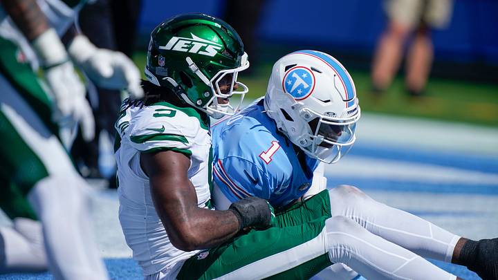 New York Jets defensive end Will McDonald IV (9) sacks Tennessee Titans quarterback Cam Ward (1) during the fourth quarter at Nissan Stadium in Nashville, Tenn., Sunday, Sept. 13, 2026. New York Jets defensive end Will McDonald IV (9) sacks Tennessee Titans quarterback Cam Ward (1) during the fourth quarter at Nissan Stadium in Nashville, Tenn., Sunday, Sept. 13, 2026.