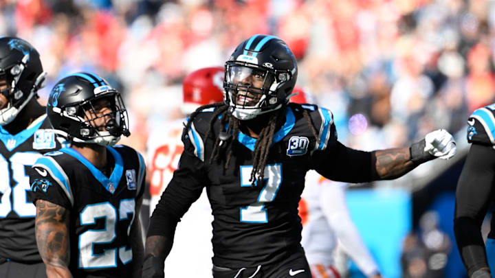Nov 24, 2024; Charlotte, North Carolina, USA; Carolina Panthers linebacker Jadeveon Clowney (7) reacts after a sack in the second quarter at Bank of America Stadium. Mandatory Credit: Bob Donnan-Imagn Images