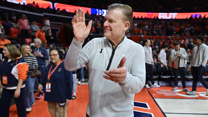 Jan 8, 2026; Champaign, Illinois, USA;  Illinois Fighting Illini head coach Brad Underwood greets the crowd before he first half against the Rutgers Scarlet Knights at State Farm Center. Mandatory Credit: Ron Johnson-Imagn Images