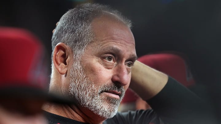 Arizona Diamondbacks manager Torey Lovullo reacts after a bat flies out of the hands of James McCann (8) while at the plate against the Miami Marlins at Chase Field in Phoenix, on June 28, 2025.